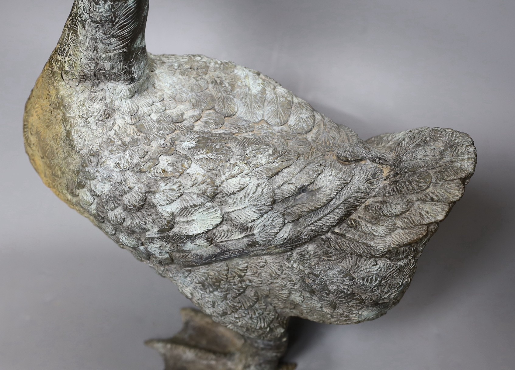 A weathered bronze garden fountain modelled as a goose, 46cm